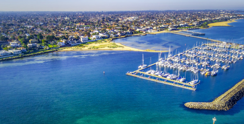 Aerial view of Middle Brighton Marina coastline and suburban area. Melbourne Australia