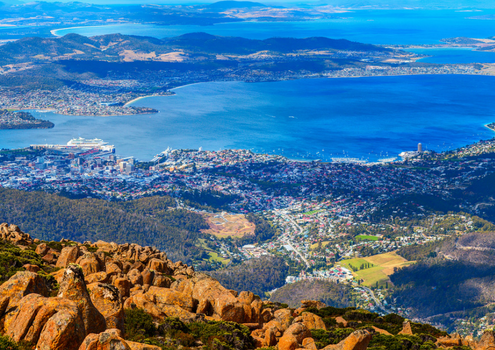 Aerial panoramic view of Hobart City and its vicinity from the Mount Wellington peak. Tasmanian Island, Australia.
